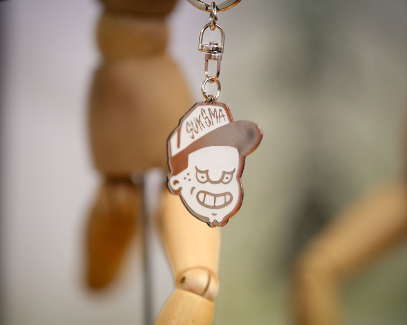 Suksma KeyChain Madman